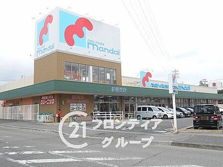 万代伊川谷店 徒歩8分。 570m