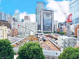 都心の眺望を心ゆくまで満喫。（空の加工を生成AIで行っています）