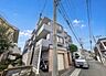 外観：流行に左右されず、将来にわたって価値が継続する上質な佇まい。（空の加工を生成AIで行っています）