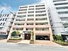 外観：下町のぬくもりと都心の利便性を享受する快適な住環境も魅力の一つ。（空の加工を生成AIで行っています）