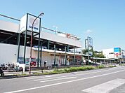 三和 鶴川店まで約879ｍ