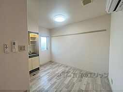 エクセレンスヴィラ’87 B 1階ワンルームのリビング/ダイニング