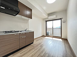 リフレスロイヤルシティIV 702 7階ワンルームのリビング/ダイニング