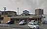 周辺：セブンイレブン 八幡小鷺田店（689m）