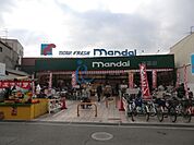 万代布施店 922m