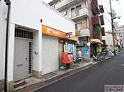 西成花園郵便局まで325ｍ