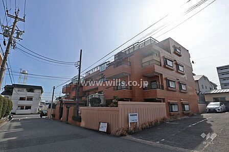 ライオンズマンション上社第2の外観(北西側から)。猪子石小学校エリアに位置する新耐震のマンションです。