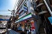 ファミリーマート梅島駅前店 90m