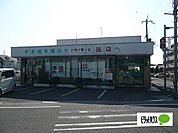 銀行「きのくに信用金庫楠見支店まで602m」