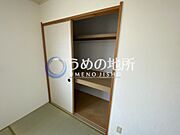 押入