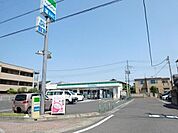 ファミリーマート越谷七左町二丁目店 46m