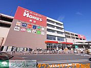 島忠ホームズ草加舎人店 徒歩12分。ショッピングセンター 950m