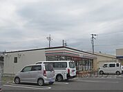 セブンイレブン　甲南町新治店まで400メートル