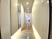 上質感漂う玄関です。居住者の帰り、訪れる方を優しく迎える・安らぎに満ちた生活を予感させます。