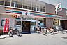 周辺：セブンイレブン狛江駅南店 629m