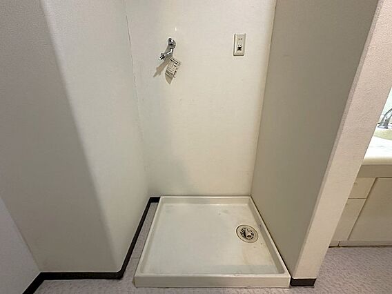 洗濯機置き場で...