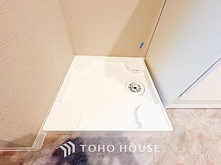 清潔感のあるカラーで統一されたランドリースペース。