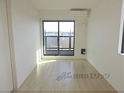 ラクーン守山 2階1LDKのリビング/ダイニング