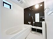 落ち着いた雰囲気でゆっくりお寛ぎいただけるバスルーム