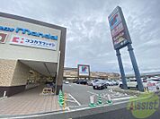 万代明石硯町店 702m