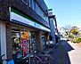 周辺：ファミリーマート 港築地口店（197m）