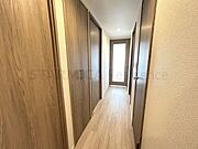 廊下は間接照明がやさしく照らす、ゆったりとした空間にしあげました