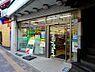 周辺：【コンビニエンスストア】 ファミリーマート都立大学駅前店まで790ｍ