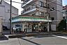 周辺：ファミリーマート 寝屋川石津南町店（345m）