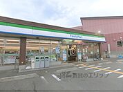 ファミリーマート　枚方尊延寺店まで600メートル