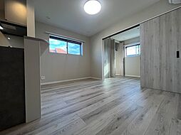 KRM RESIDENCE TSUKAGUCHI 1階2LDKのリビング/ダイニング