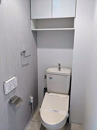 温水洗浄便座　...