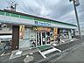 周辺：ファミリーマート　上牧桜ヶ丘店まで1800メートル