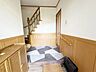 玄関：広々とした玄関です。光が入ってきてとても明るい玄関です。朝の通勤や通学の時に明るい玄関だと元気が出ます。