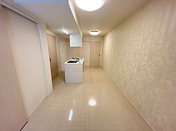 カルモ愛宕 1階1LDKのリビング/ダイニング