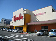 原信 関屋店（703m）