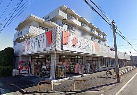 ドラッグストアセキ堀の内町店 徒歩4分。 310m