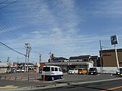 セブンイレブン江井島駅前店まで750m