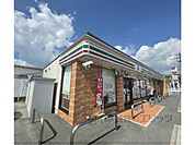 セブン-イレブン 香芝穴虫店まで450メートル