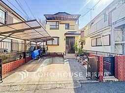 家族をやさしく迎える、落ち着きある住まいの佇まい