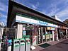 周辺：ファミリーマート 近鉄東生駒駅前店（590m）