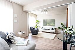 フレキシブルドアを開けることで約20畳の広々空間として利用できます。（同タイプモデルルーム撮影）