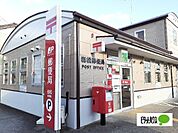 郵便局「岩松郵便局まで406m」