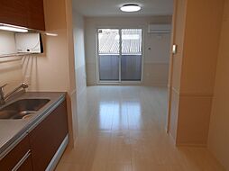 エソラ雄郡 3階1LDKのリビング/ダイニング