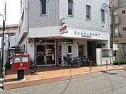 足立本木一郵便局（719m）