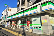 ファミリーマート 竹ノ塚駅西店（100m）