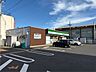 周辺：ファミリーマート 小倉緑ヶ丘店 820m