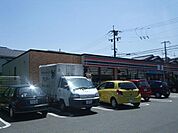 セブンイレブン大阪狭山東野中店 594m