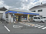 ローソン　香芝下田西四丁目店まで240メートル