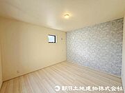 【洋室】シンプルなデザインが心地よい居室はリビングとの一体感が感じられます