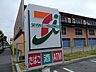 周辺：セブンイレブン　草加瀬崎町店 590m